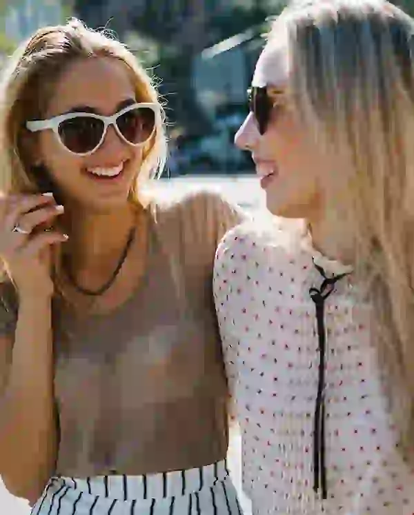 Friends laughing at Identity Miami
